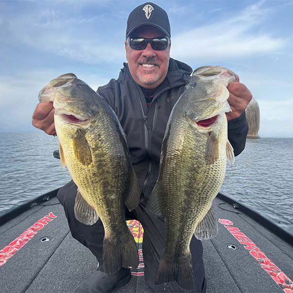 Mark Zona holding Bass